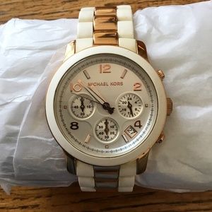 Micheal Kors White and Gold women’s watch